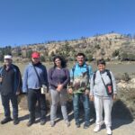 Photo de groupe devant les pontons