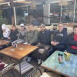 Photo de groupe au restaurant