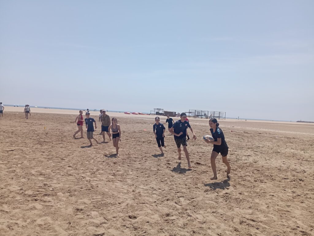 Match de rugby sur la plage
