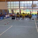 4 participant en pleine partie de boccia