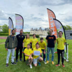 Photo de groupe sur la pelouse du stade