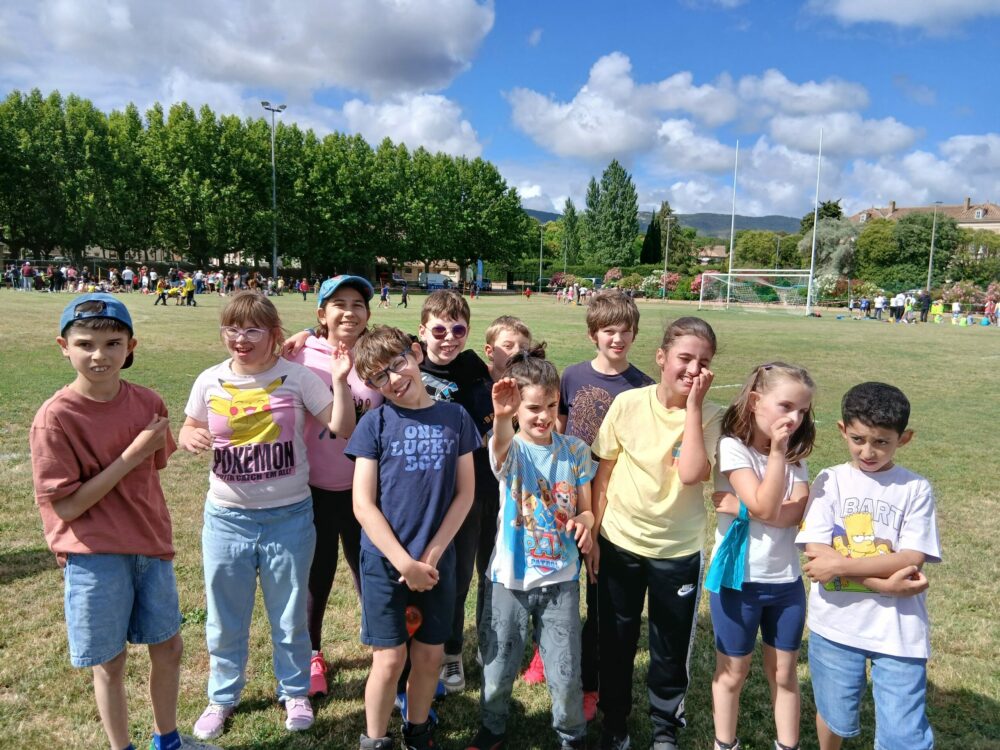 Photo de groupe sur le stade après l'effort